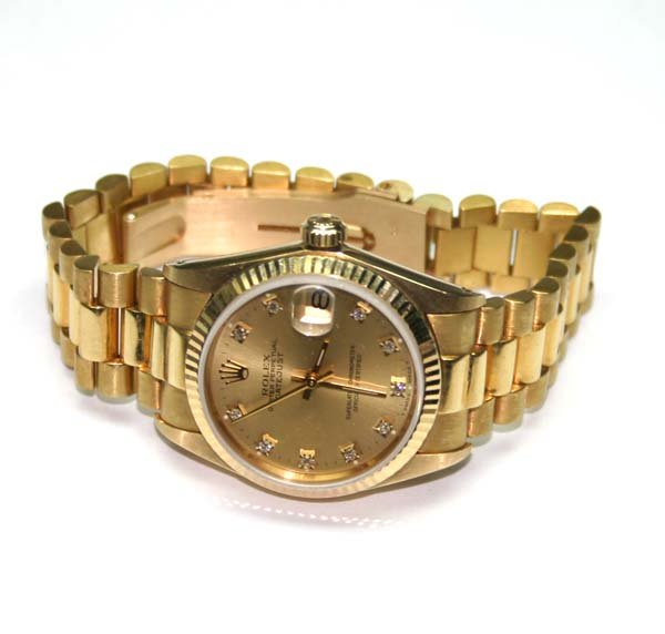 ROLEX DIAMOND DAIL 18K DATE MIDSIZE .