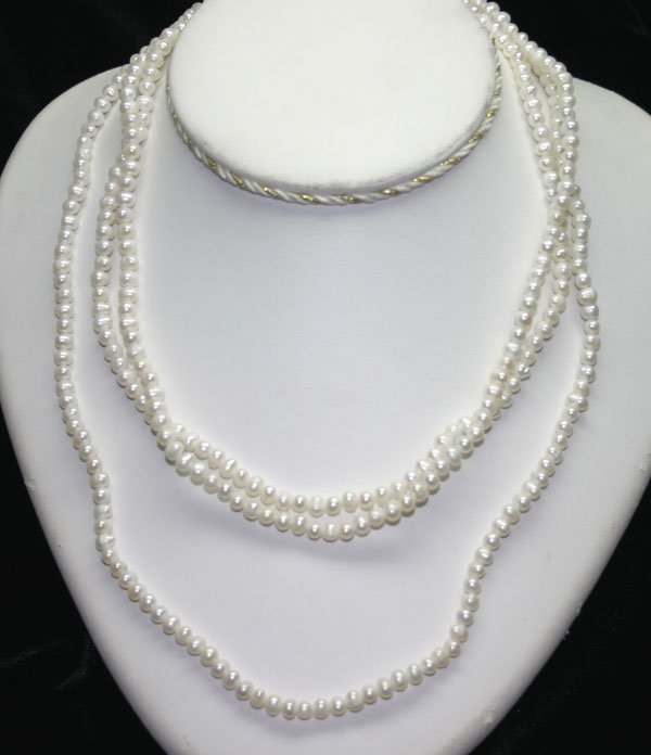54'' INCHS 5mm FRESH WATER PEARL NECKLACE .