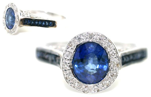 3 CT DIAMOND & SAPPHIRE 5 GR 14KT GOLD RING.