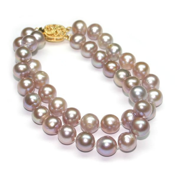 9 mm FRESH WATER PEARLS BRACELET .