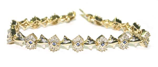 16.70 GRAMS 14K Y/G 3.5 CT DIA SAPPHI BRACELET