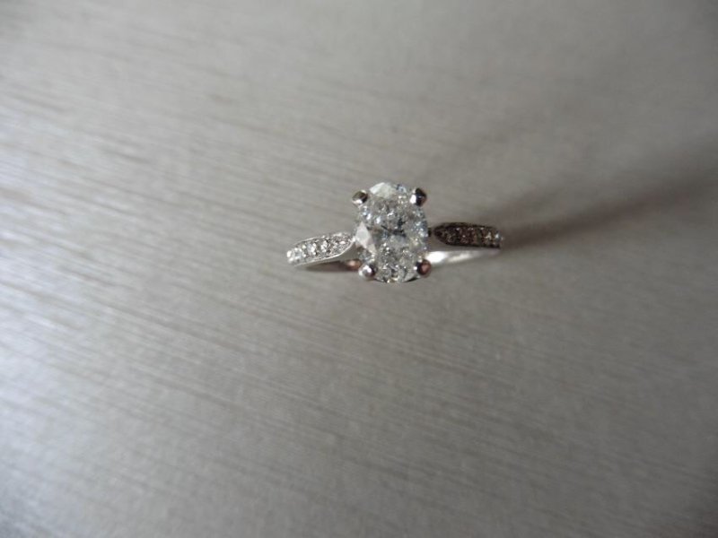 0.82ct oval diamond set solitaire ring in platinum (1 of 4)