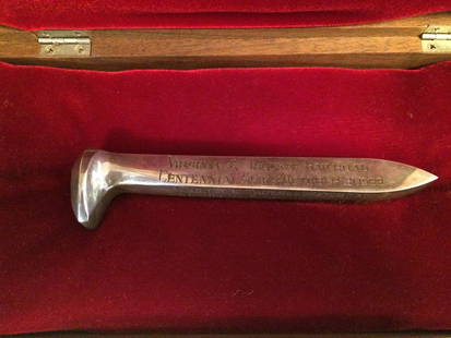 1lb - Pure Silver Commemorative Railroad Spike: From the collection of Ted Marla. Carson City, NV Mint.Rare opportunity. Both aesthetic and physical value.1lb. Sterling Silver .999 Railroad Spike. Commemorative with Certificate & Original Box