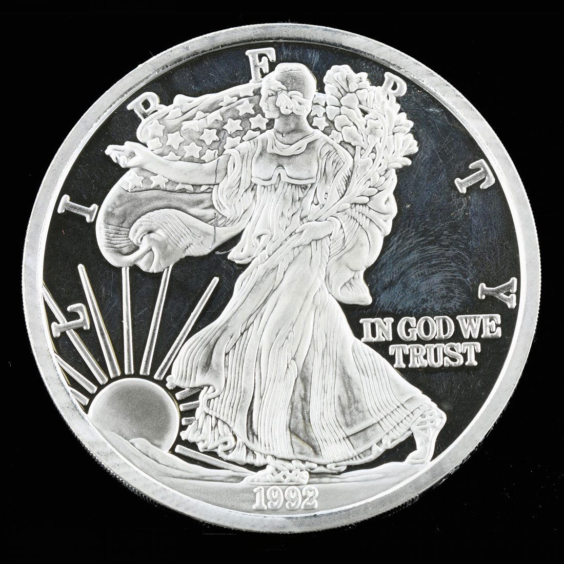 United State of America One Pound Fine Silver 1992: One, United State of America One Pound Fine Silver 1992 Liberty Coin, Weighing 274.30gr equal to 12.03 Ounces.