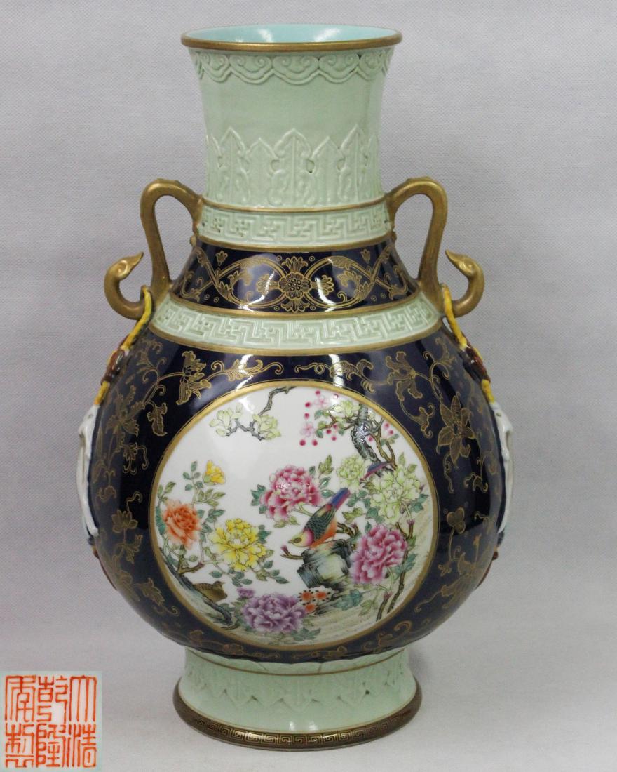 DAQING QIANLONG NIANZHI MARK ROBIN'S EGG GLAZED VASE: With QianLong NianZhi mark. The vase is covered with black glaze.The vase is decorated with birds and flowers. Height 14.17 in Diameter 10.62 in