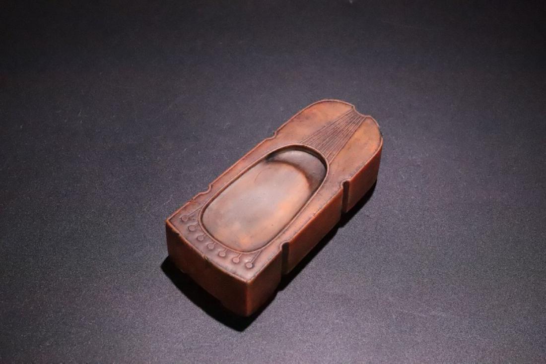 17-19TH CENTURY, A MUSICAL INSTRUMENT DESIGN DUAN STONE: WITH FULL APPEARANCE. DIMENSION thickness 2.8cm; length 10.7cm; width 4.7cm