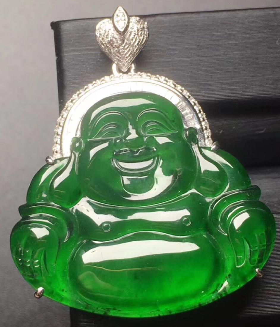 A GREEN JADEITE CARVED BUDDHA PENDANT, TYPE A: Dimension 31.2 x 26.7 x 4 mm. Nature Type A. Authenticity Guarantee. Accept Re-Exammmation and Fake Return. With Certificate of Identification.