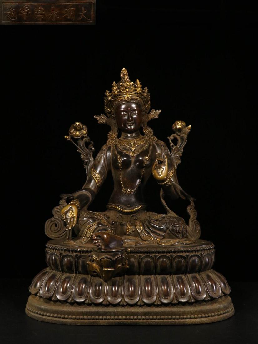A DAMING YONGLE MARK GILT BRONZE BUDDHA: Time: Since 1912 / Weight 22 kg / Length 19.49 in / Width 12.99 in / Height 24.61 in