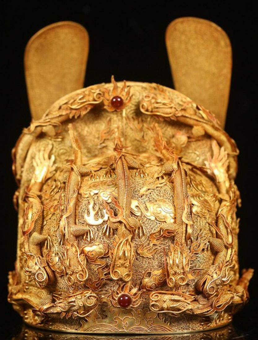 A GILT SILVER HAT EMBEDDED WITH AGATE: 16-17 Century. Dimension (1) 21 x 18.6 x 18.8 cm