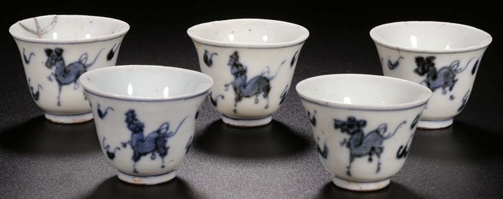SET OF BLUE AND WHITE GLAZE TEA CUPS WITH BEAST PATTERN: Since 1912. Dimension: 4.5/5.9/2.5cm