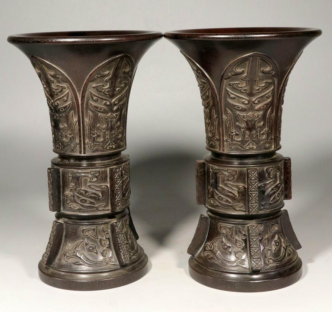 A XIAOYE ZITAN VASE CARVED TAOTIE PATTERN: Dimension 24.1 x 15.2 x 11.1cm