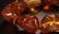 AN AMBER CARVED BRACELET - 6