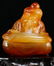 AN AGATE CARVED FIGURE SHAPED PENDANT - 2