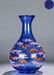 A GLASS CARVED VASE