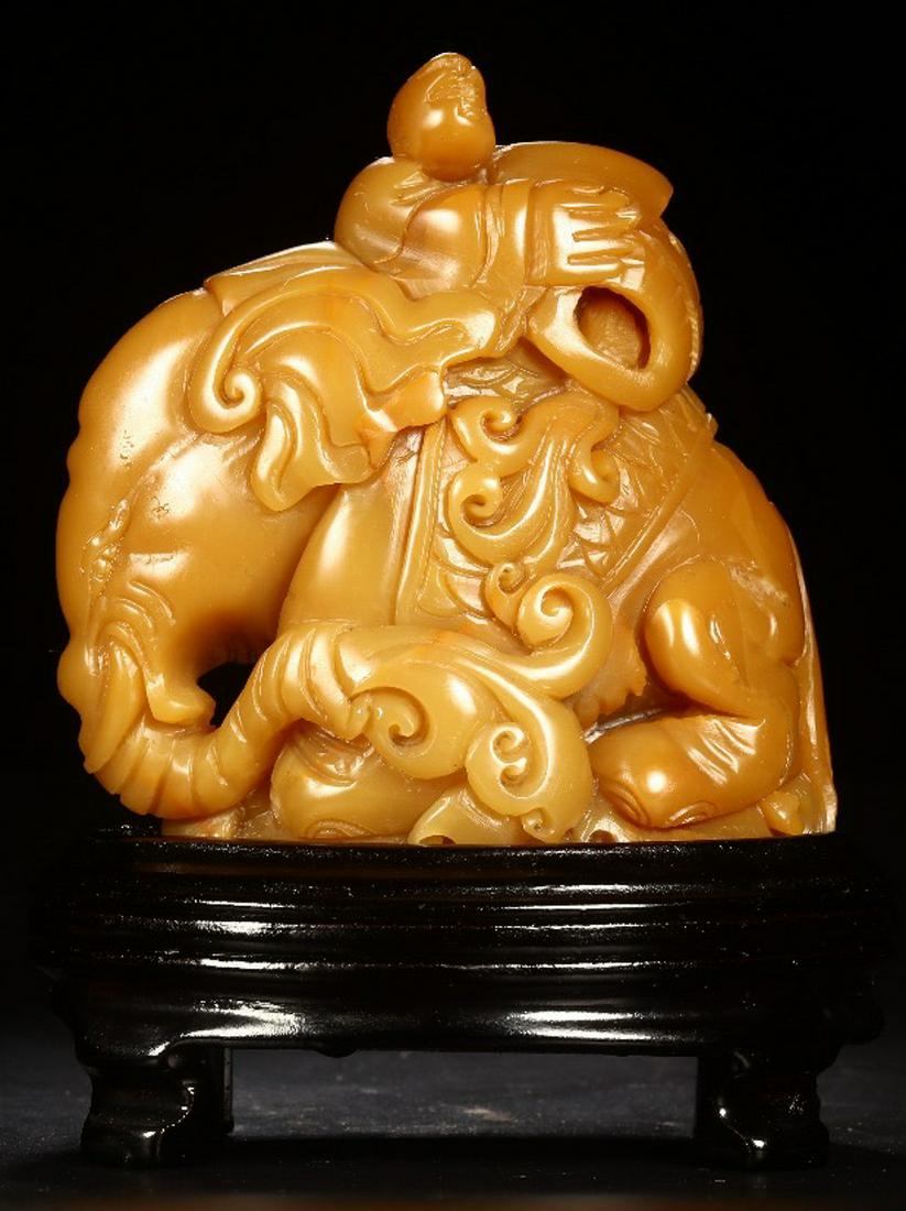 A SOAPSTONE CARVED CHILD ELEPHANT SHAPE PENDANT: Length 8.5 cm/ Height 8.5 cm/ Weight 265g