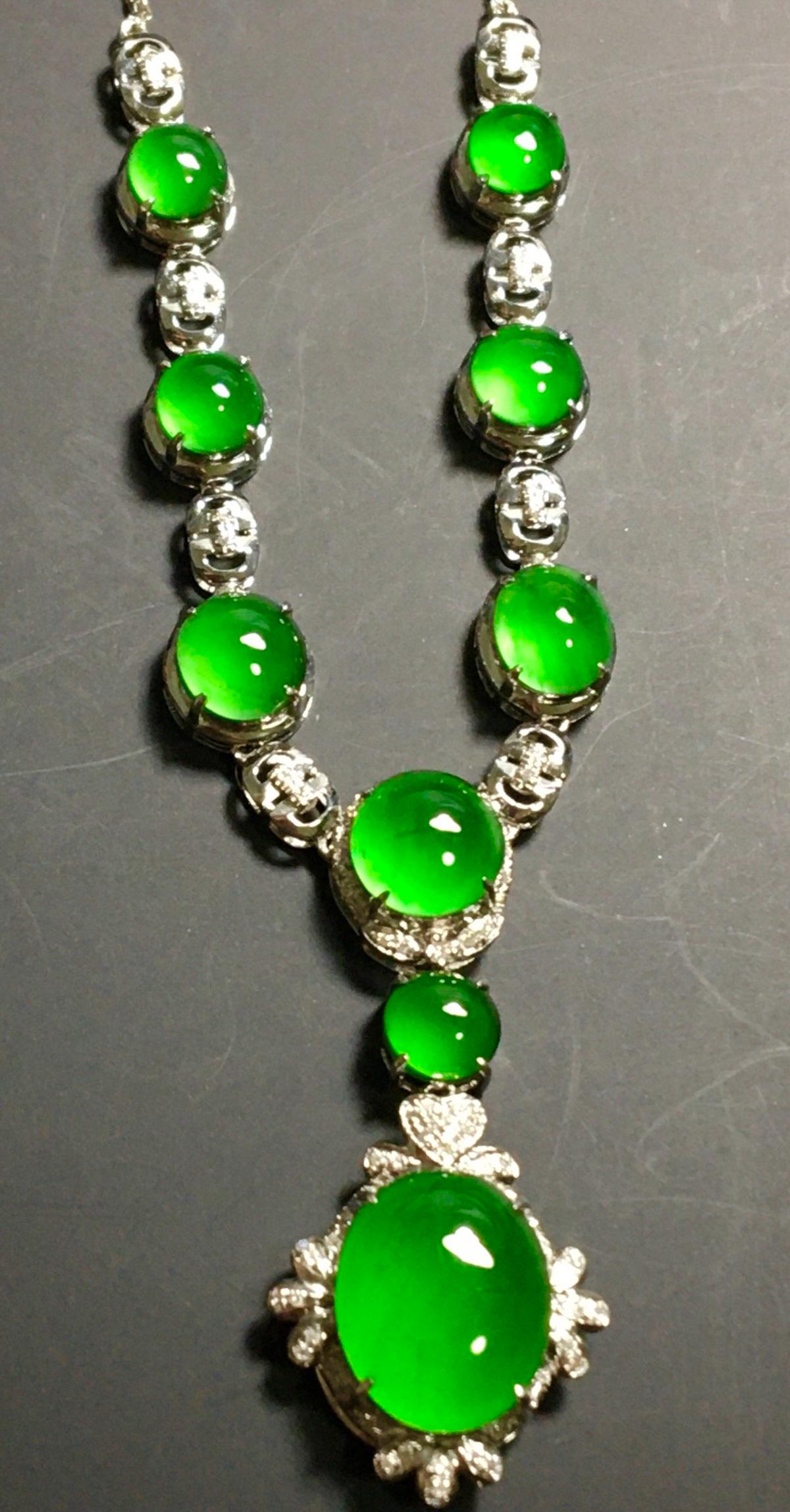 ICY GREEN JADEITE NECKLACE: Big-Jadeite Dimension 11 x 9.5 x 4 mm / Samll-Total Dimension 5 x 5 x 3 mm. Made in Myanmar Natural Jadeite. Type A. Authenticity Guarantee. Accept Re-Examination and Fake Return. With Certificate of