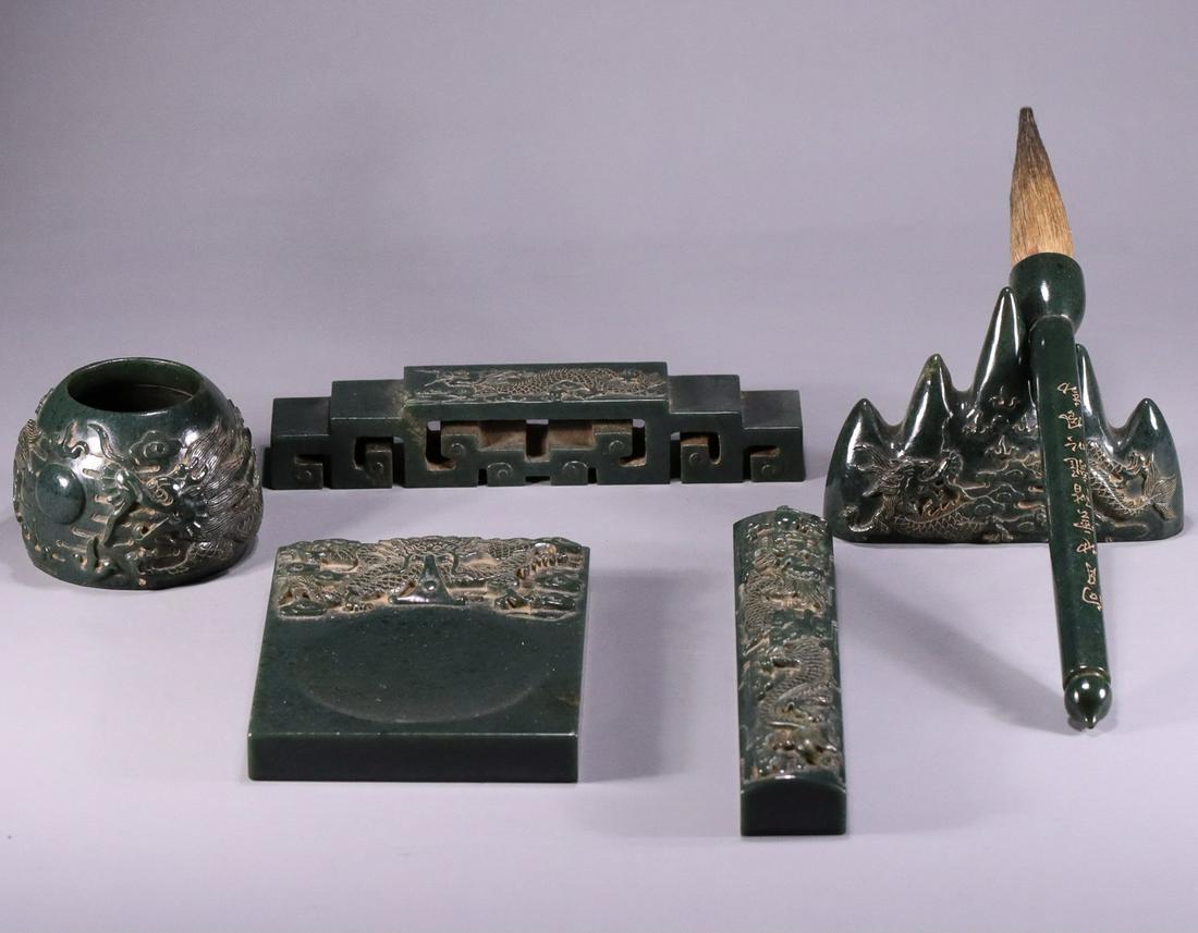 HETIAN JASPER CARVED DRAGON CALLIGRAPHY SUPPLIES: (1)brush washer Dimension 5.7 x 7.9 x 4.1 cm / Weight 332 g (2)INKSTONE Dimension 13.7 x 9.9 x 2.4 cm / Weight 691 g (3)ink bed Dimension 17.2 x 3 x2.5 cm / Weight 31.6 g (4)paperweight Dimension 19 x