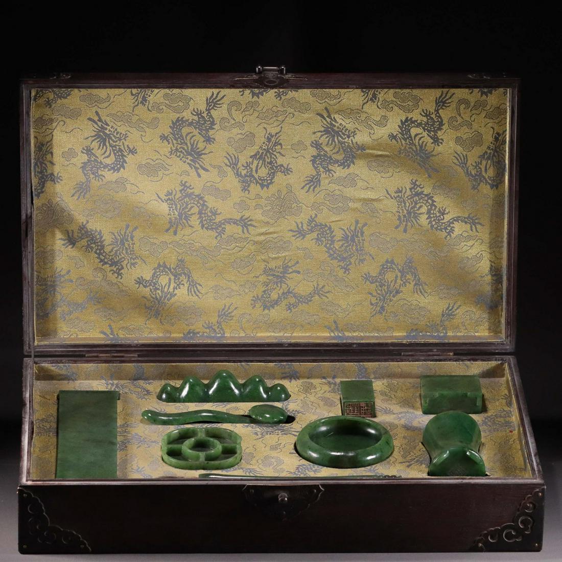SET OF HETIAN JASPER CARVED CALLIGRAPHY SUPPLIES: Ink-Bed 20 x 6 x 1.2 cm / Brush Pot 7.6 x 5.6 cm / Box 4.7 x 5.6 cm / Brush Washer(1) 2.1 x 9.1 cm / Brush Washer(2) 7.4 x 1.4 cm / Ruyi 13.9 x 3.8 x 2 cm / Brush Holder 3.5 x 12.6 x 2.8 cm / Weight 2