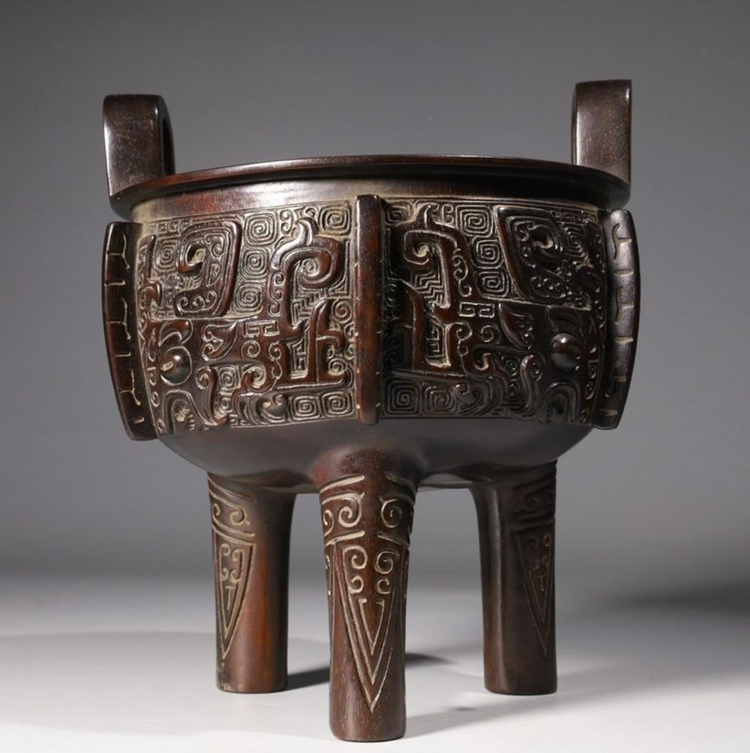 XIAOYE ZITAN WOOD CARVED BEAST PATTERN TRIPOD CENSER: Diameter 17 cm / Height 20.2 cm / Weight 876g