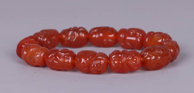 AGATE CARVED MONKEY PATTERN BRACELET: Bead-Diameter 1.76 cm / Width 1.35 cm / Weigh 47 g / For more detailed description of this item please leave message to us or contact us at Email: info@empireauctioninc.com