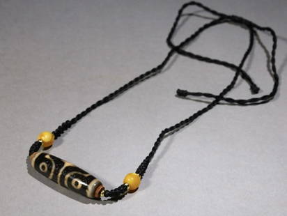 TIBETAN AGATE DZI NECKLACE: Length 4.1 cm / Width 1.2 cm / Weight 14 g / For more detailed description of this item please leave message to us or contact us at Email: info@empireauctioninc.com