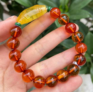 AMBER CARVED BEADED BRACELET: Bead-Diameter 0.9 cm / SIze 2.9 x 1.4 cm / Width 12.3g