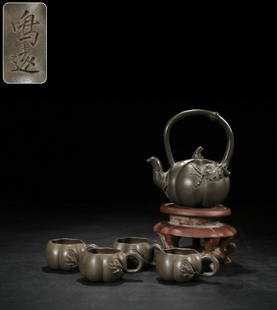 CHENMINGYUAN MARK PUMPKIN SHAPE ZISHA POT: Length 13.2 cm / Width 9.7 cm / Height 14.5 cm / Cup Length 9 cm / Width 6.5 cm / Height 4.3 cm , Chen Mingyuan, a master of Yixing zisha pot maker during the Kangxi period of Qing Dynasty in China,