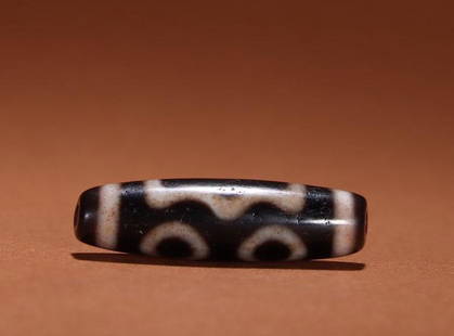 CINNABAR THREE EYES PATTERN DZI: Length 3.7 cm / Width 1 cm, (L 1.5 in / W 0.4 in), For more detailed description of this item please leave message to us or contact us at Email: info@empireauctioninc.com / www.empireauctioninc.com/