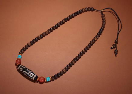 TIBETAN NINE EYES PATTERN DZI NECKLACE: Length 3.8 cm / Width 1.6 cm / Weight 18 g, (L 1.5 in / W 0.6 in), For more detailed description of this item please leave message to us or contact us at Email: info@empireauctioninc.com /