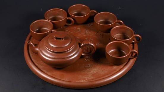 SET OF ZISHA TEAPOT AND TEACUPS: Tray Diameter 34.5 cm / Pot Length 19 cm / Width 12.7 cm / Height 8.5 cm / Cup Length 9.3 cm / Width 7.2 cm / Height 4 cm / Total Weight 3686 g, (Tray Diameter 13.6 in / Pot L 7.5 in / W 5 in / H 3.3
