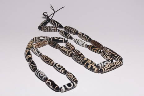 TIBETAN DZI NECKLACE: Length 5.7 cm / Diameter 1.5 cm / Weight 313 g, (L 2.2 in / Diameter 0.6 in), For more detailed description of this item please leave message to us or contact us at Email: info@empireauctioninc.com /