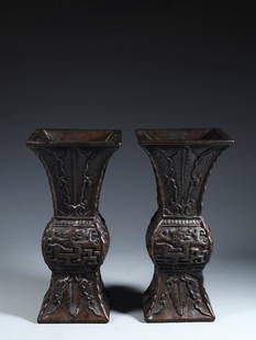 PAIR OF CHENXIANG WOOD CARVED DRAGON PATTERN VASES: Width 12.5 cm / Height 27.5 cm / Weight 781 g, (W 4.9 in / H 10.8 in), For more detailed description of this item please leave message to us or contact us at Email: info@empireauctioninc.com /