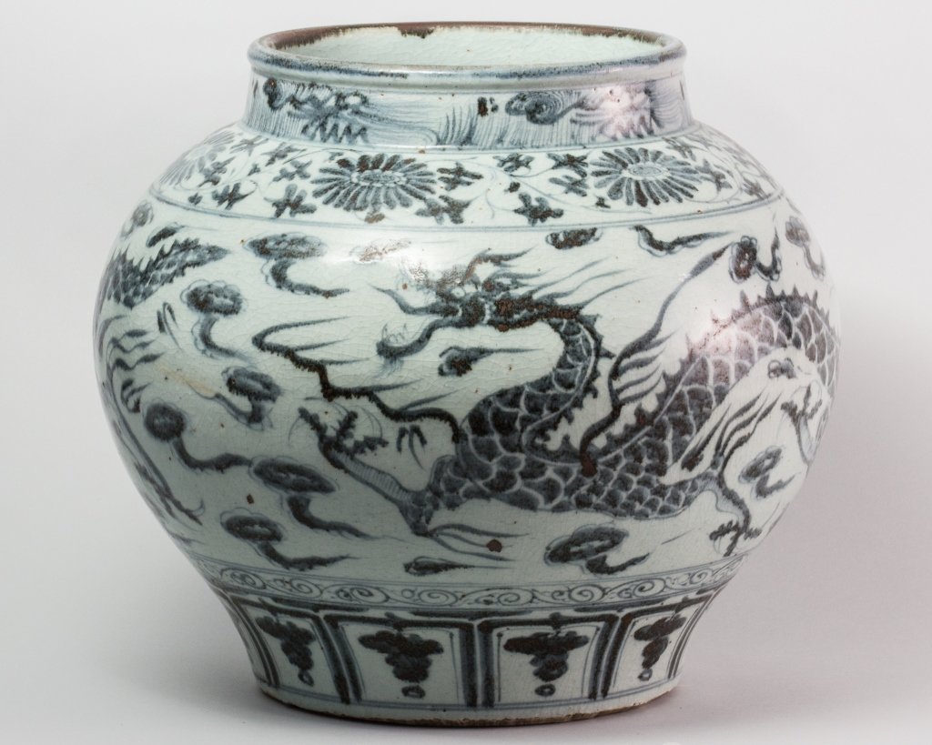 MING DYNASTY STYLE BLUE AND WHITE JAR: Ming Dynasty Style Blue and White Jar decorated with a Flying Dragon. Overall good condition. H 13.5 in W 8.25 in