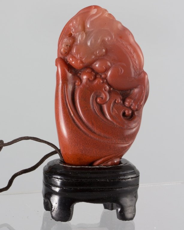 Soapstone FuRong ZhuSha RuiShou Pendant: Soapstone FuRong ZhuSha Pendant, carved with RuiShou pattern. Dimension 2.75 in x 1.6 in 壽山石芙蓉朱砂瑞獸把件