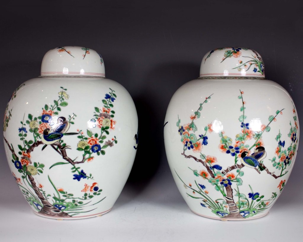 Pr of Wucai Covered Ginger Jars: Pair of Wucai Covered Jars, late Qing dynasty to Republic period, 1875-1949. Bird and floral decoration. Overall very good condition. Height 279mm, diameter 140mm at bottom. Purchased at Christie's NY