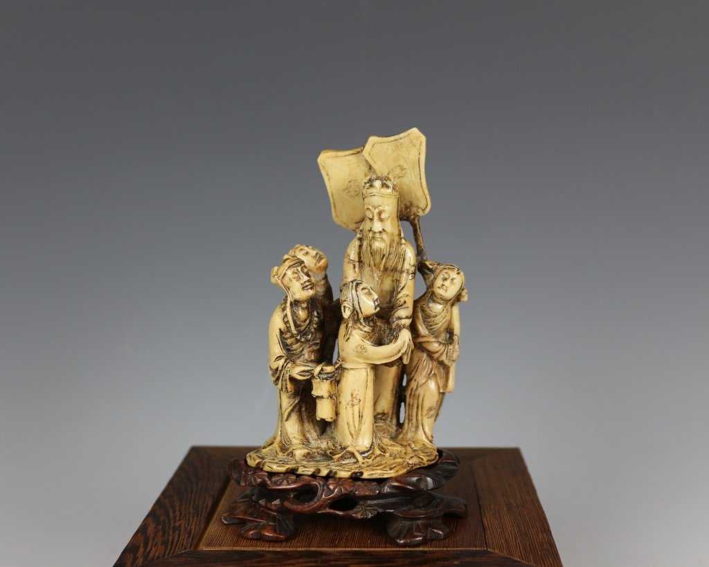 QING SOAPSTONE FIGURE CARVING: Qing dynasty. The soapstone is finely carved with five figures. With wooden base. H 5.25 in
