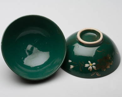 Pair of Japanese Green Glaze Dishes: Pair of Japanese Green Glaze Dishes, each dish is supported on the round foot, and covered inside and out with a rich green glaze, with the unglazed bottom of foot. D 4.25 in