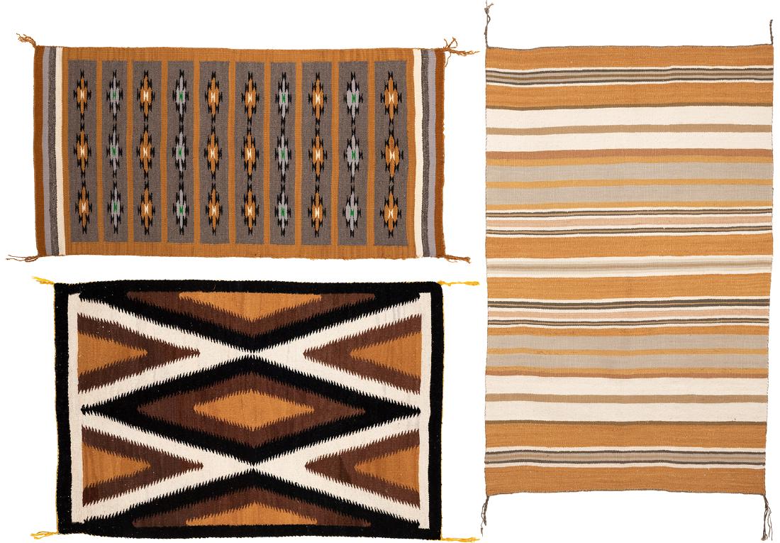 Navajo | Lot of Three: Gallup Throw, Chinle Rugs: Artist: Navajo Title: Lot of Three: Gallup Throw, Chinle Rugs All unsigned Media: Wool Dimensions: Clockwise from upper left: Chinle: 61 by 31 inches, Chinle: 54 by 34 inches, Gallup throw: 53 by 35 i