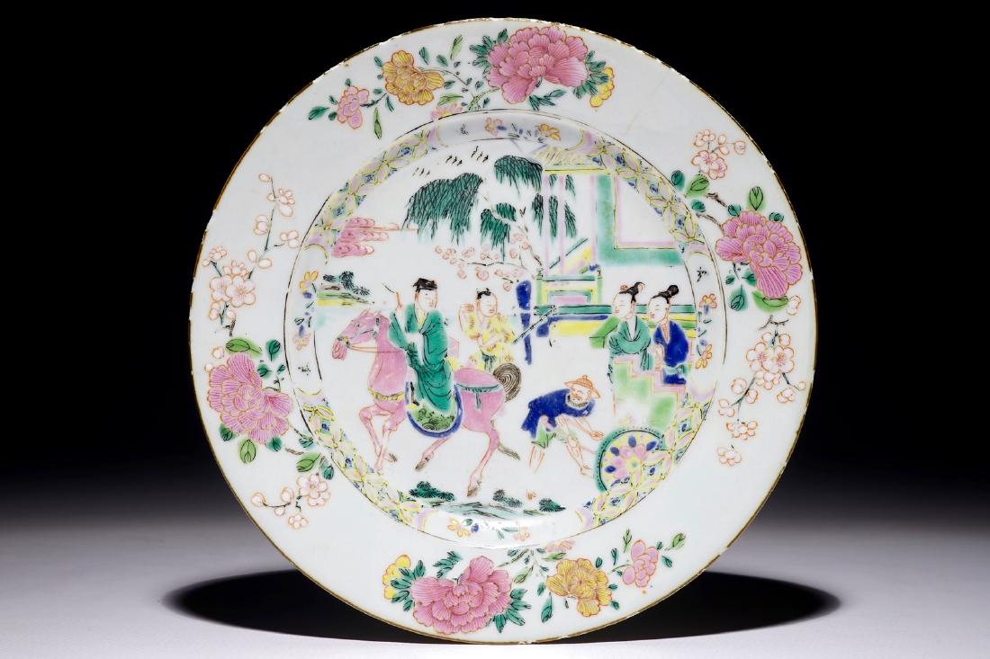 A Chinese famille rose plate with figures in a garden,: A Chinese famille rose plate with figures in a garden, Yongzheng Dia.: 22,5 cm