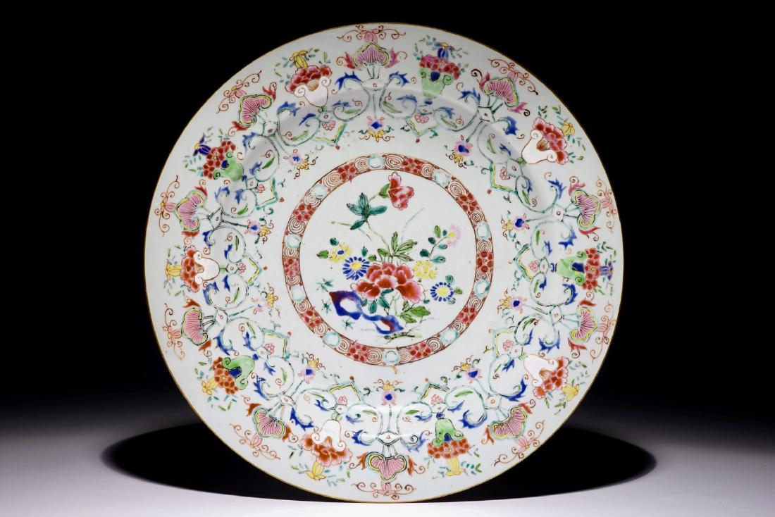 A large Chinese famille rose dish with a central flower (1 of 2)
