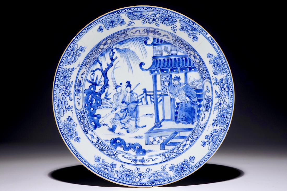 A Chinese blue and white charger with a scene from "The: A Chinese blue and white charger with a scene from "The Romance of the Western Chamber", Yongzheng Dia.: 34 cm