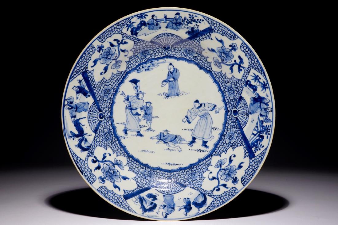 A blue and white Chinese dish with a punishment scene, (1 of 2)