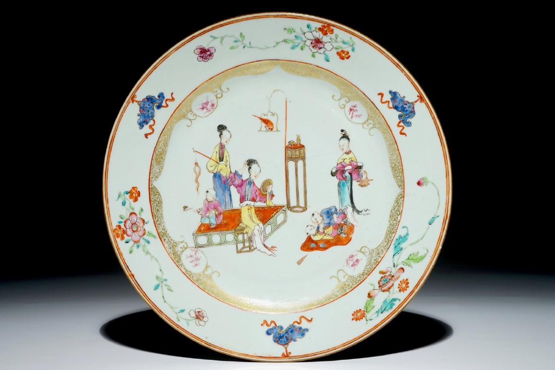 A Chinese famille rose charger with "long elizas" and: A Chinese famille rose charger with "long elizas" and little boys, Qianlong Dia.: 31 cm