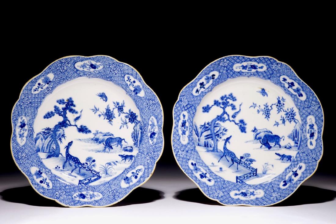 A pair of Chinese blue and white plates with animals in: A pair of Chinese blue and white plates with animals in a garden, Qianlong Dia.: 22,5 cm