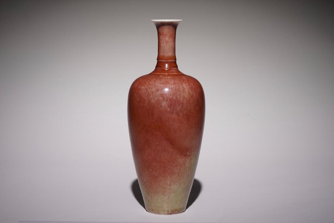 A Chinese monochrome copper-red vase, Kangxi mark, (1 of 6)