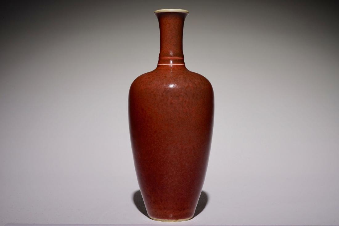 A Chinese monochrome copper-red vase, Kangxi mark, (1 of 6)