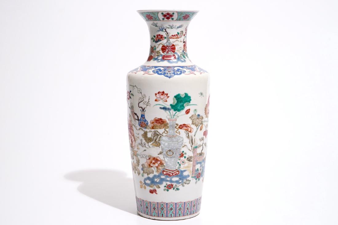 A Chinese famille rose rouleau vase in Yongzheng style,: A Chinese famille rose rouleau vase in Yongzheng style, early 19th C. H.: 43,5 cm