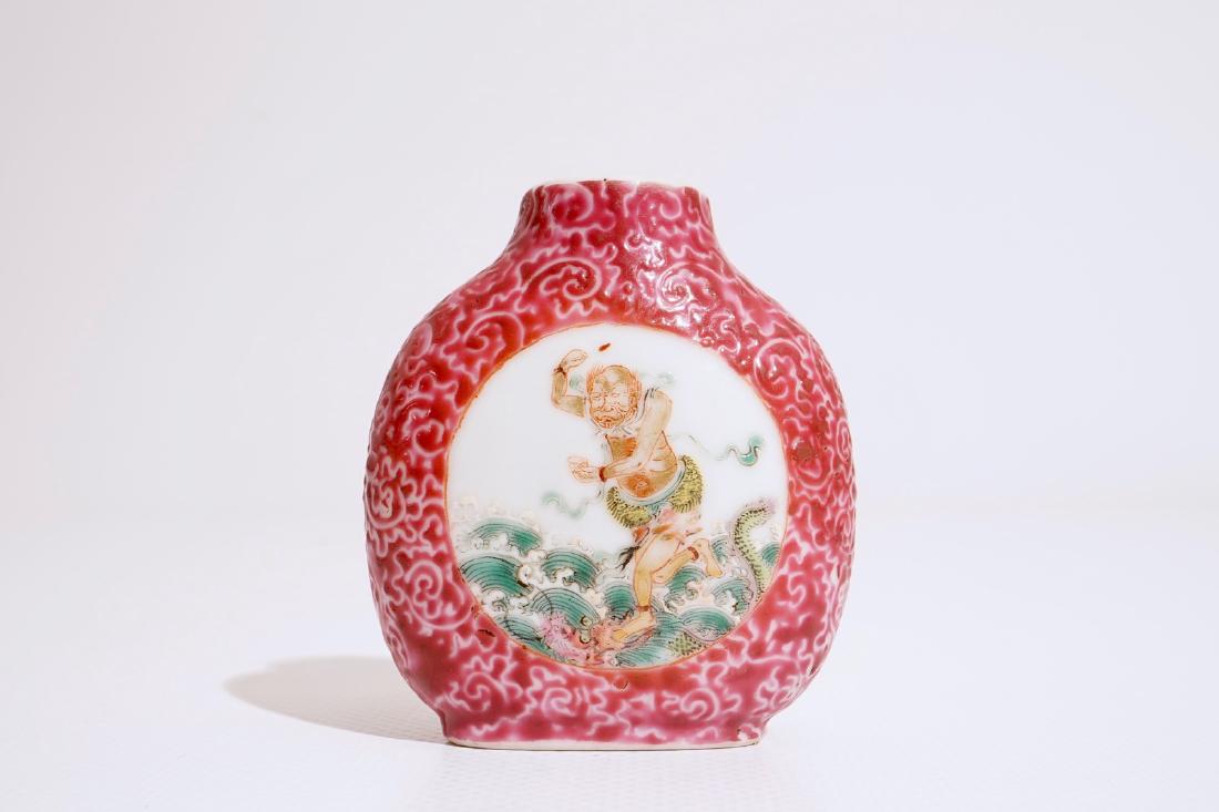 A fine Chinese famille rose ruby ground snuff bottle, (1 of 6)
