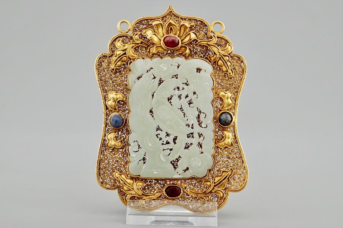 A Chinese gilt filigree silver hat ornament with jade (1 of 3)