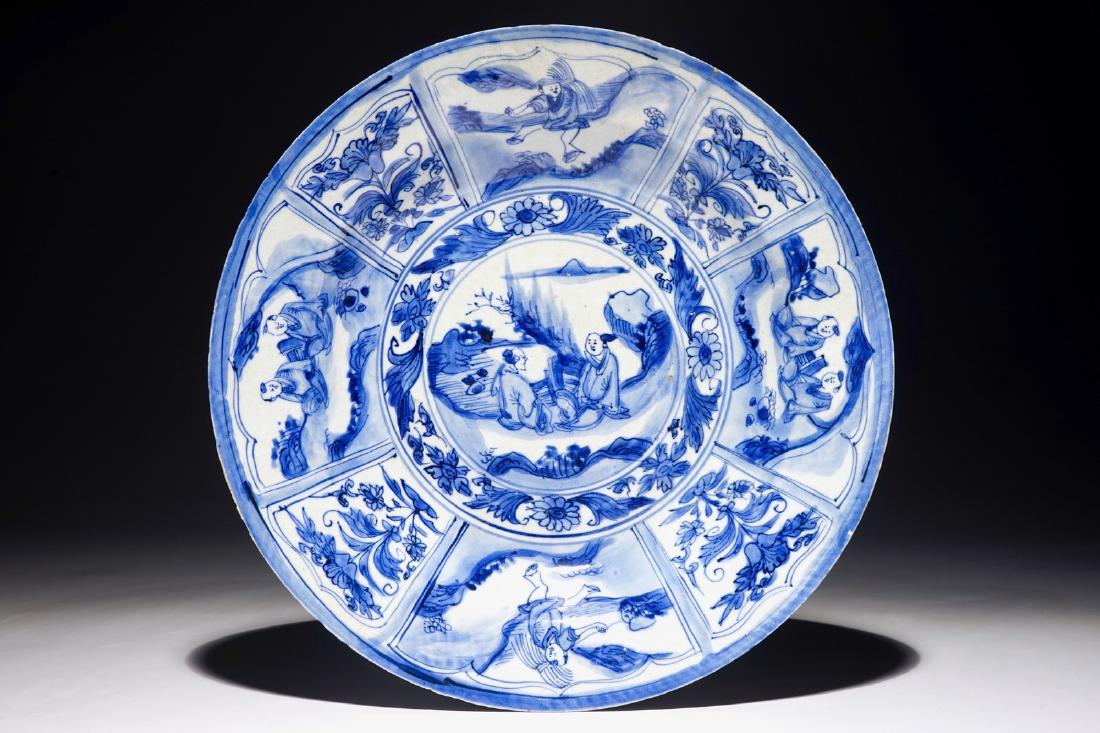 A Chinese blue and white dish with figures in a (1 of 2)